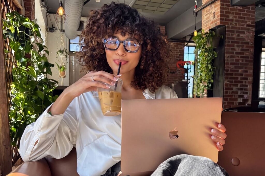 Woman With Laptop And Coffee